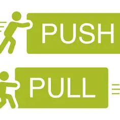 Zielona ikona z sylwetką człowieka pchającego (PUSH) i ciągnącego (PULL) drzwi.